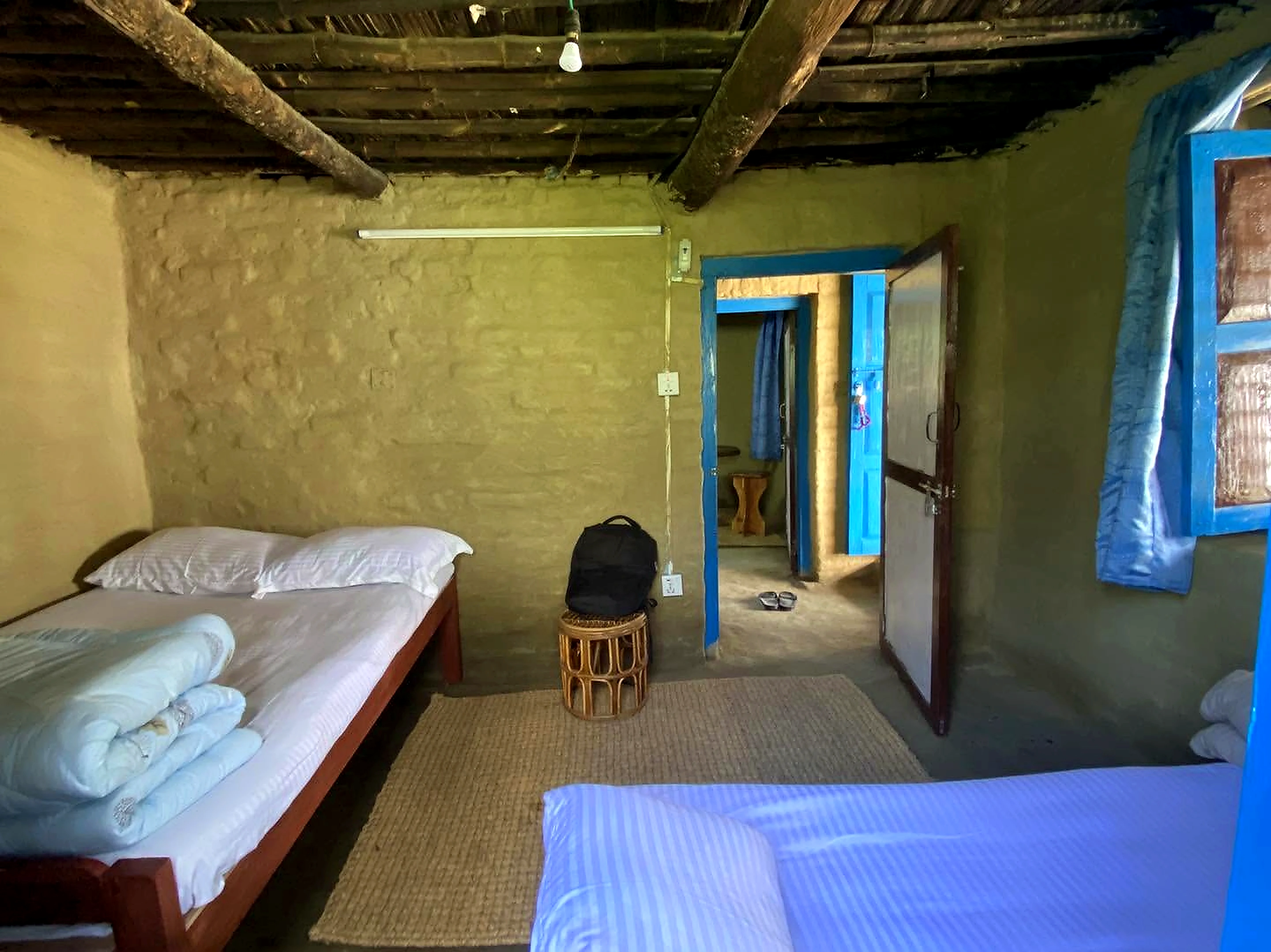 Purano Ghar cozy bedroom